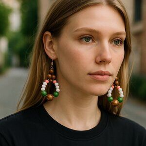 Fun in the Summertime. White wood green and pink beaded hoop earrings